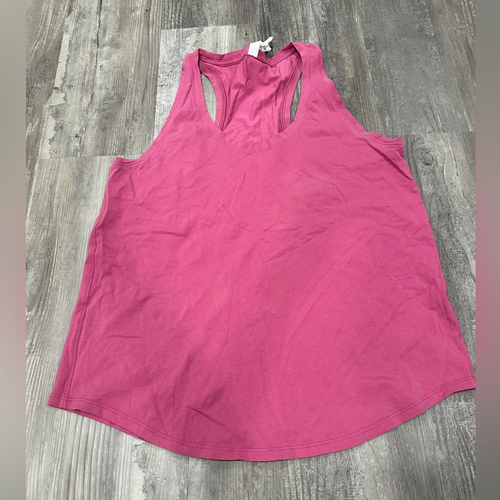 Excellent used condition Lululemon Love Tank Top
Pink Lychee sz 10